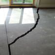a huge crack in a concrete slab floor in Elizabeth