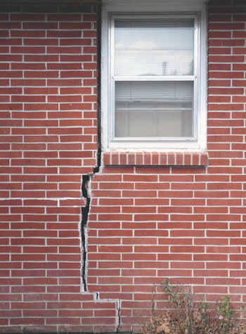 severe foundation wall cracks along a window in West Orange, NJ