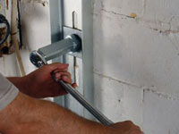 Mounting a foundation wall channel anchor in Clifton.