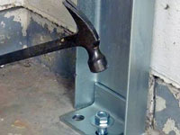 Mounting a foundation channel anchor installation to the floor in Clifton.