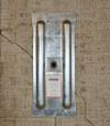 A fully exposed wall anchor plate installed along a Belleville, NJ foundation wall