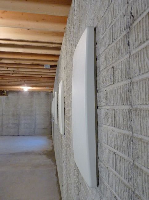 Teaneck, NJ wall anchor covers viewed from the side to show how narrow they are.