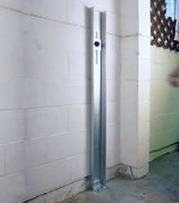 A failing foundation wall repaired with a foundation wall channel anchor system in a Edison home.