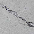 sinking outdoor concrete in need of mudjacking in Newark