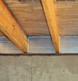 SilverGlo™ insulation installed in a floor joist in Astoria