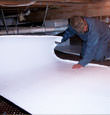 Newark insulation being installed in a crawl space.