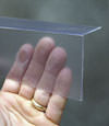 Closeup of a clear plastic covering on a Ridgewood crawl space block wall