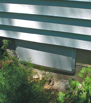A gray crawl space vent cover in Passaic