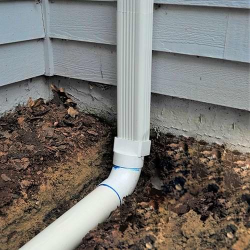 Quality 1st Basement Systems installs gutter downspout extensions in Edison, Freehold, Jersey City