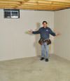 Mount Freedom basement insulation covered by EverLast™ wall paneling, with SilverGlo™ insulation underneath