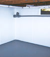 Jersey City, NJ & PA wet basement wall covering that tucks into a perimeter drainage system