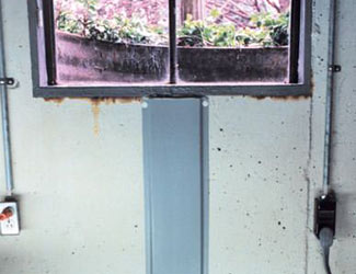 Repaired waterproofed basement window leak in Woodbridge